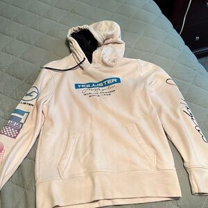 Hollister Men's Light Pink Graphic Hoodie